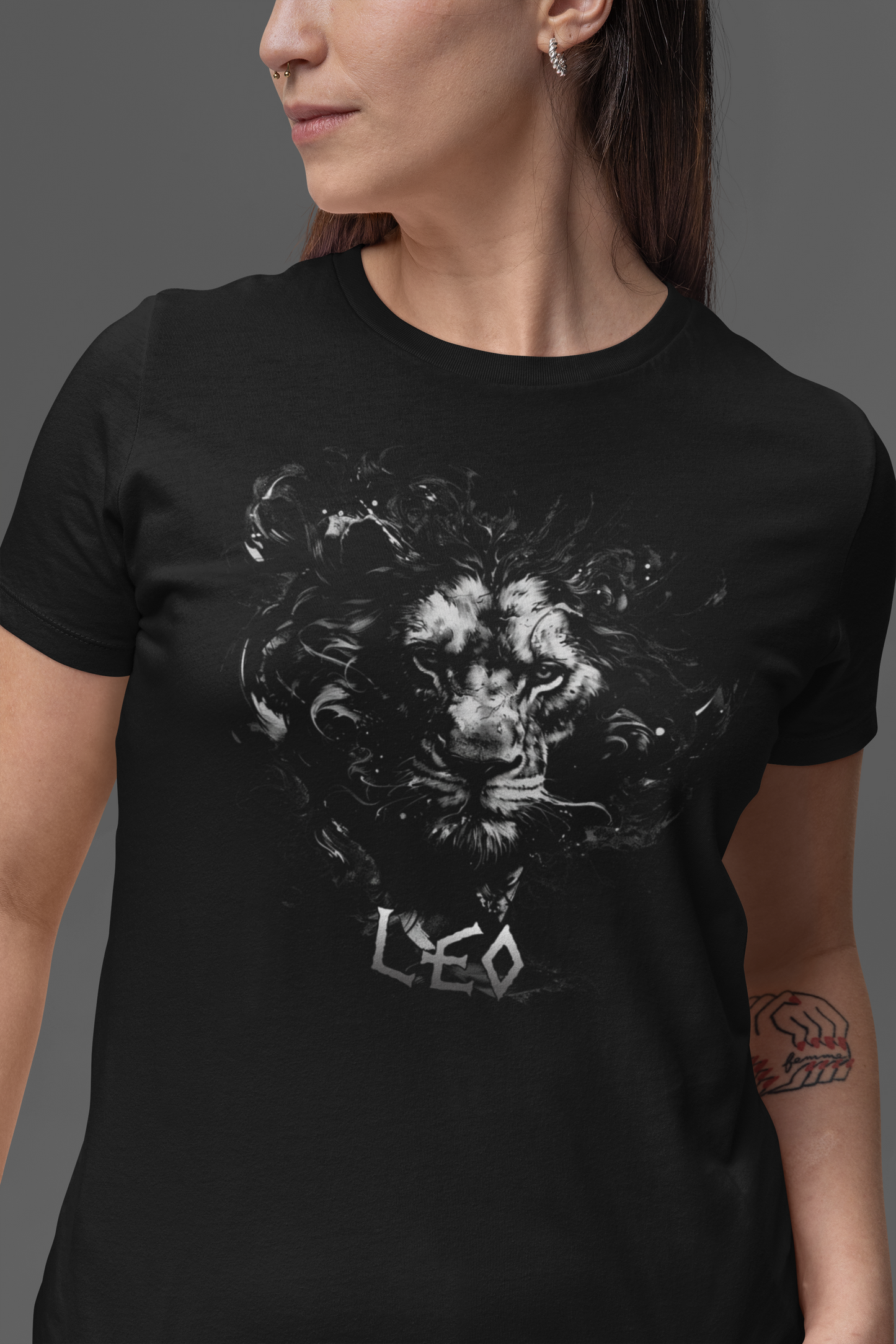 Black t-shirt featuring a vector art design of a lion’s head. A bold and stylish choice for  those seeking a powerful graphic design. The Zodiac Collection: LEO Short-Sleeve Unisex T-Shirt - DarkSongWear