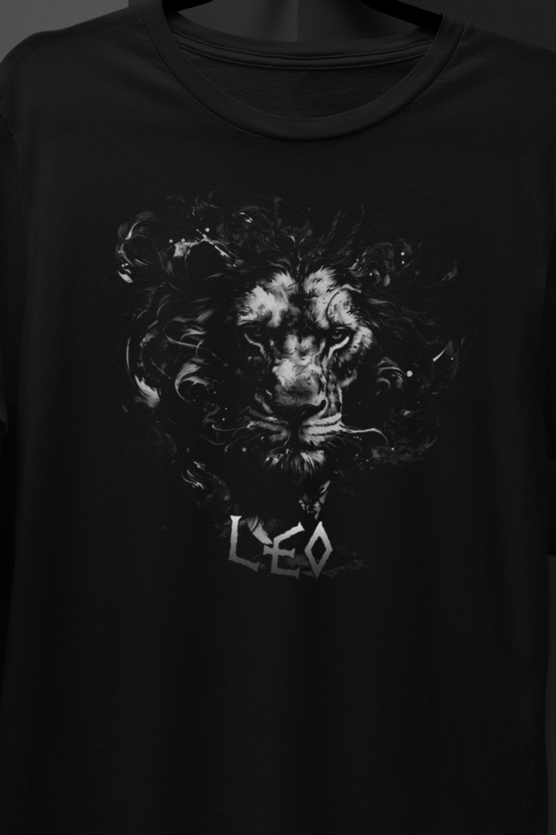 Black t-shirt featuring a vector art design of a lion’s head. A bold and stylish choice for  those seeking a powerful graphic design. The Zodiac Collection: LEO Short-Sleeve Unisex T-Shirt - DarkSongWear